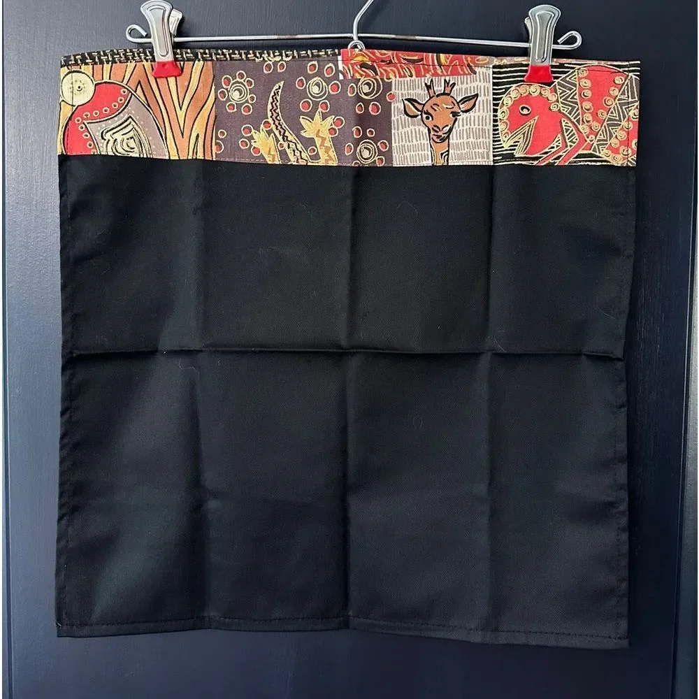 NWT Pair of Cloth Napkins from Africa. Plain black with printed lined edge 16.5”